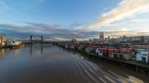Time Lapse of Clouds and Water Reflection along River in Portland OR at Sunset Stock Footage 46132368