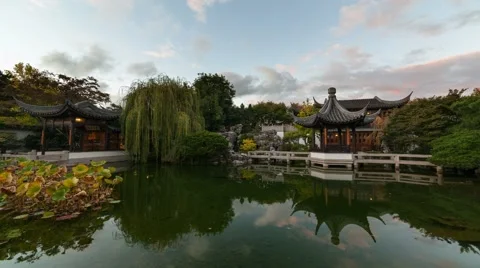 Time Lapse of Clouds and Water Reflection in Lan Su Chinese Garden in Portland Stock Footage 56361137