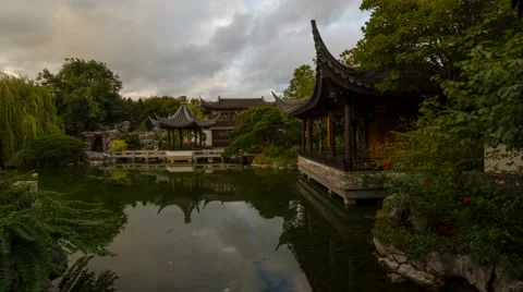 Time Lapse of Clouds and Water Reflection in Lan Su Chinese Garden Portland OR Stock Footage 56361898