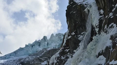 Time lapse with clouds and waterfall near the glacier Stock Footage 61819653