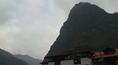 Time lapse of clouds around a mountain in Peru near Machu Picchu at sunrise. Stock Footage 57366586