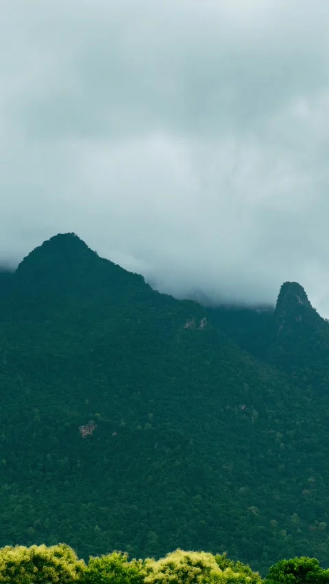 Time-lapse of clouds atop Doi Luang Chiang Dao. Concept of climate and weather.  Stock Footage 314503679