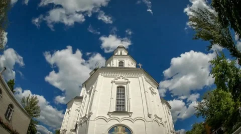 Time lapse of clouds on the background of the Church Stock Footage 50260056