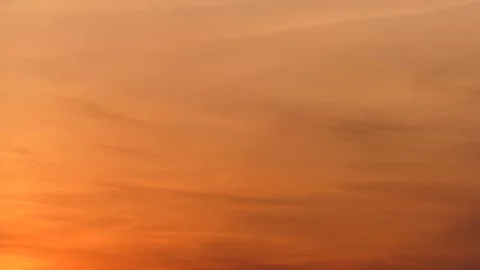 Time lapse clouds for background - orange sky with rising sun Stock Footage 140593235