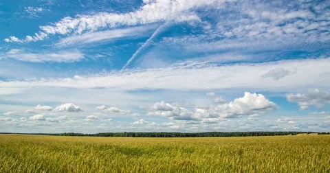 Time-lapse of clouds in a beautiful landscape video loop Stock Footage 79079072