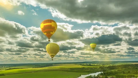 Time lapse clouds in a beautiful summer landscape with a balloon, video loop Stock-Footage 106888196