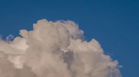 Time-lapse of clouds billowing and exploding Stock Footage 31808857