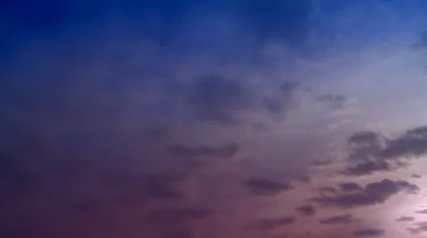 Time-lapse clouds in blue and violet sky. Stock Footage 3125374
