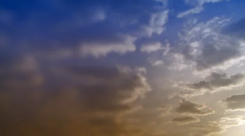 Time-lapse clouds in blue and orange sky. Stock Footage 3125533