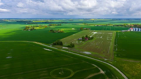 Time-Lapse of Clouds Casting Shadows Over Agricultural Fields Stock Footage 311430498