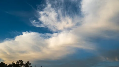 Time Lapse of Clouds Changing from White to Yellow Stock Footage 278333063