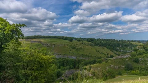 Time lapse of clouds at Chee Dale, Buxton, Derbyshire, England, United Kingdom Stock Footage 280717519