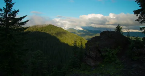 Time Lapse of clouds churning over  Mt. Jefferson in Oregon as the Moon rises Stock Footage 68010176