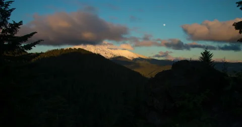 Time Lapse of clouds churning over  Mt. Jefferson in Oregon as the Moon rises Stock Footage 68010183