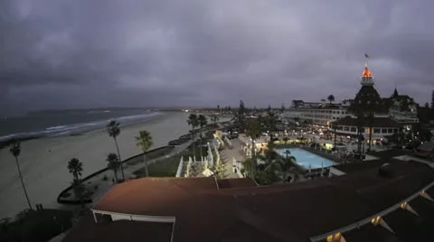 Time lapse of clouds clearing above the historic Hotel Del Coronado in San Stock Footage 11516642