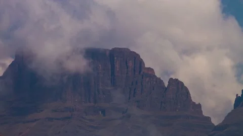 Time lapse Clouds close around Cathkin peak in Maloti Drakensberg until covered Stock Footage 155387394