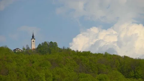 Time lapse of clouds cloud moving behind the hill Stock Footage 154408929