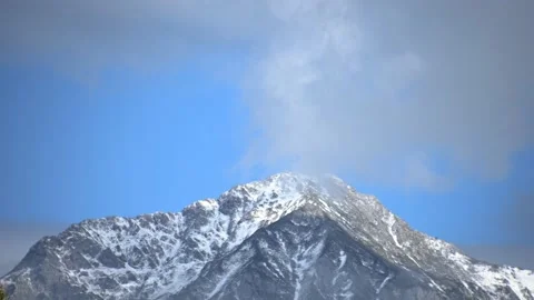 Time lapse clouds covering Alps mountains. Winter season Stock Footage 140181304