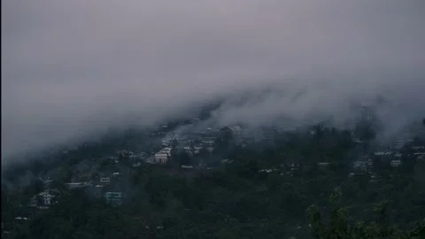 Time-lapse of Clouds covering an entire city Kohima on top of a hilly Stock Footage 134932583