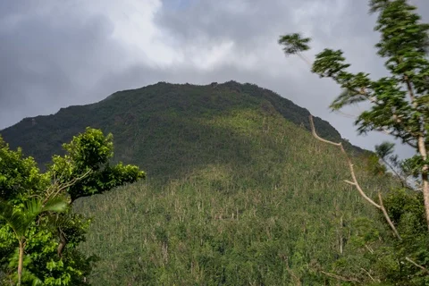 Time lapse of clouds creating shadows over mountain Stockbeeldmateriaal 91159256