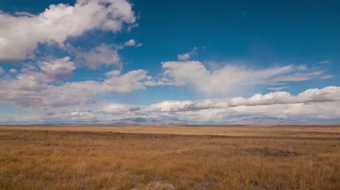 Time lapse clouds cross open prairie, Idaho - Time Lapse 2006 HD, 4K Stock Footage 58050883