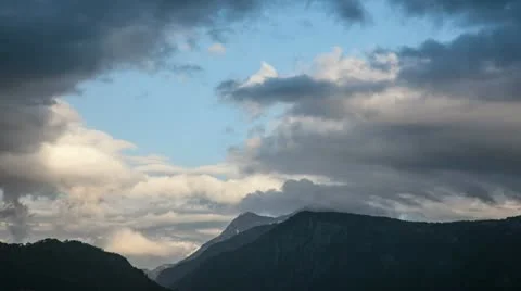 Time lapse of clouds a dark sky near mountains Stock Footage 11129200