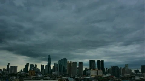Time lapse of clouds dark sky and cloudy moving over the Bangkok skyline Stock Footage 176666595