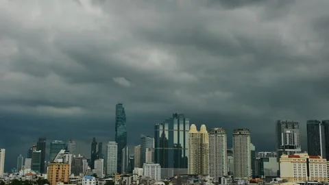 Time-lapse of clouds dark sky and cloud moving over the Bangkok skyline Stock Footage 253389262