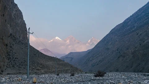 Time lapse of clouds at dawn over mountains in the himalayas, Nepal Stock Footage 258426774