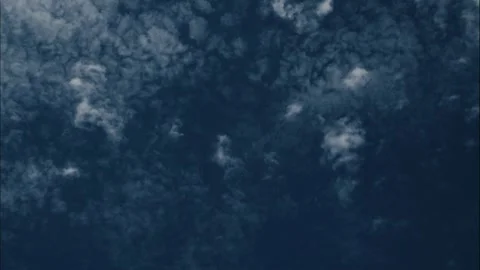 Time Lapse of Clouds Dissipating to Deep Blue Sky Stock Footage 317780555