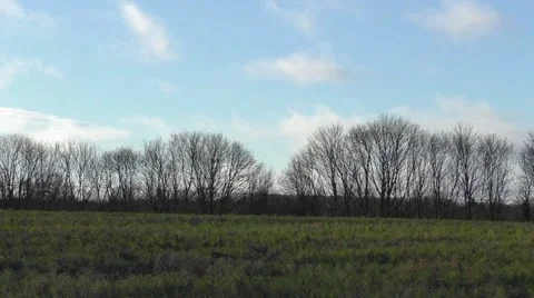 Time Lapse: Clouds drift over a rural landscape Stock Footage 45906218