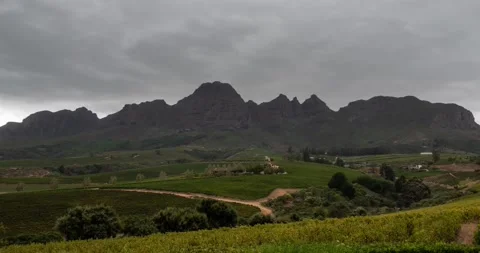 Time lapse of clouds drifting over rocky mountains at Stellenbosch Stock-Footage 151002603