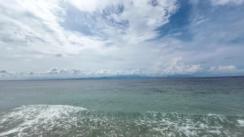 Time-lapse of Clouds Drifting Over Calm Ocean Waters, Bali Stock Footage 238005271