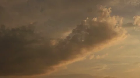 Time lapse of clouds during sunset Stock Footage 5581472