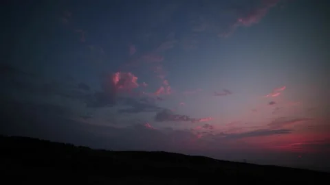 Time lapse of clouds during a sunset Stock Footage 137341885