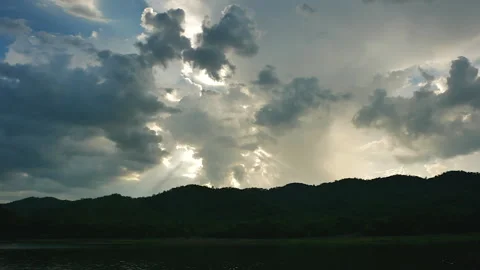 Time-lapse of Clouds fast in the sky and sunset on a large natural Stock Footage 253389241