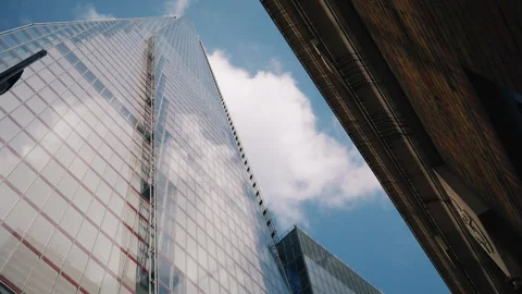 Time lapse. Clouds float above the old and modern buildings. London. Stock Footage 88982029