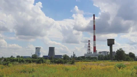 Time lapse clouds float over thermal power plants. Stock Footage 138142674