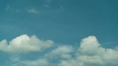 Time Lapse Clouds Float in the Sky Stock Footage 137933358