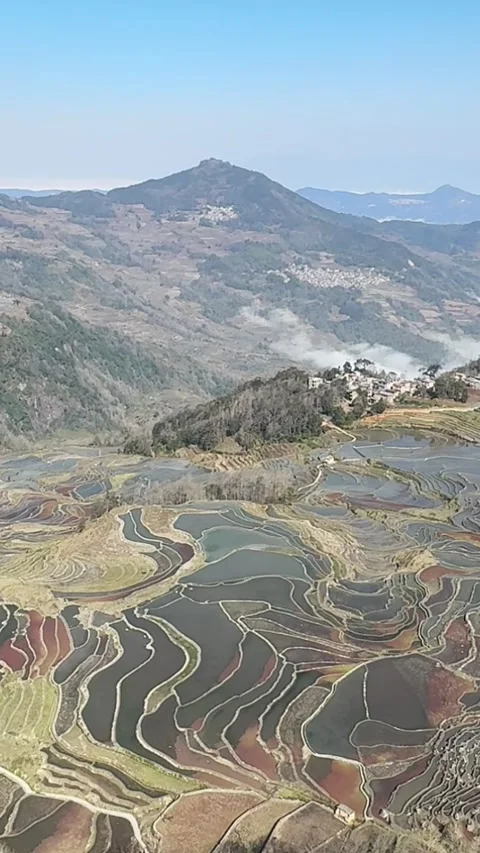 Time-lapse of clouds flowing over Yuanyang Hani Rice Terraces, Yunnan, China Video stock 328791459
