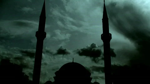Time lapse clouds flowing past twin minaret mosque 3 Stock Footage 573683