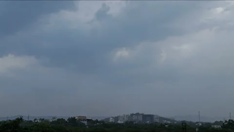 Time lapse of clouds formation and movements, sun rays and windy atmosphere Stock Footage 131356617