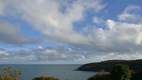 Time lapse of clouds forming and moving over cliffs Stock Footage 69869762