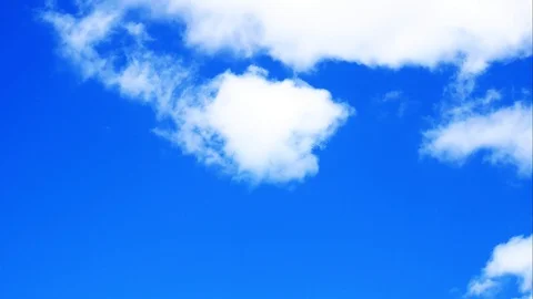 A time lapse of clouds forming in a blue summer's sky Stock Footage 95164822