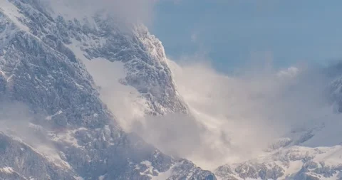 Time lapse of a clouds forming high in the mountains Stock Footage 237987490