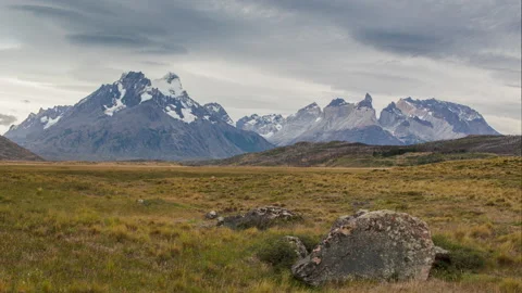 Time lapse of clouds forming over mountains in Torres del paine, Patagonia Stock Footage 258419403