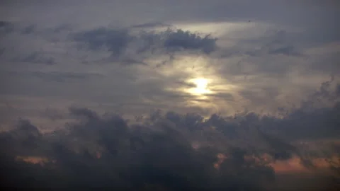 Time lapse: Clouds Forming at Sunset on a Stormy Night Stock Footage 136364306