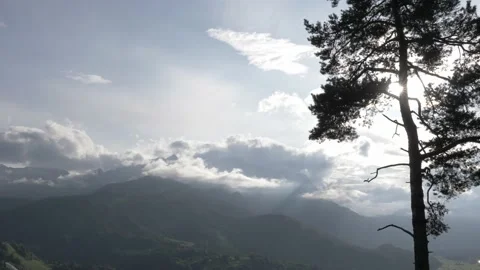 Time-lapse of clouds in front of creamy blue sky Video stock 168066625