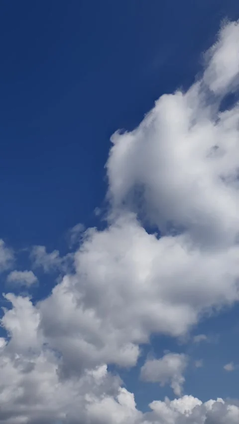 Time-Lapse of Clouds Gliding in the Sky. Vertical Video. Video stock 285846805