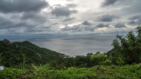 Time lapse of clouds in Koh Tao Thailand with wind and shadow on the ocean Stock Footage 84845344